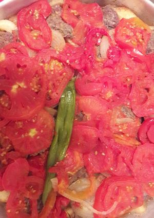 A picture of Kofta Casserole with Potatoes and Tomatoes.