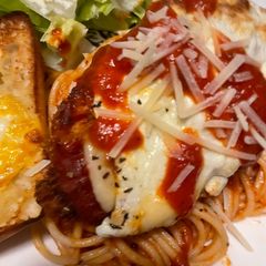 A picture of Less saucy chicken Parmesan.