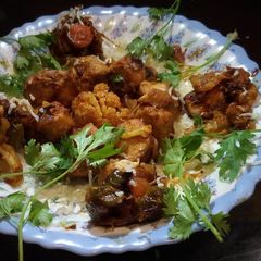 A picture of Sizzling chicken barbeque.