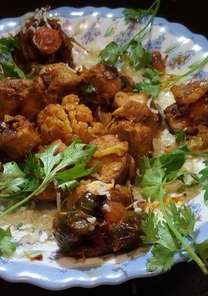 A picture of Sizzling chicken barbeque.