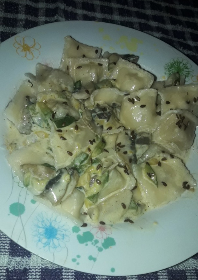 Una foto de Ravioles de ricota con salsa agridulce (veggie)