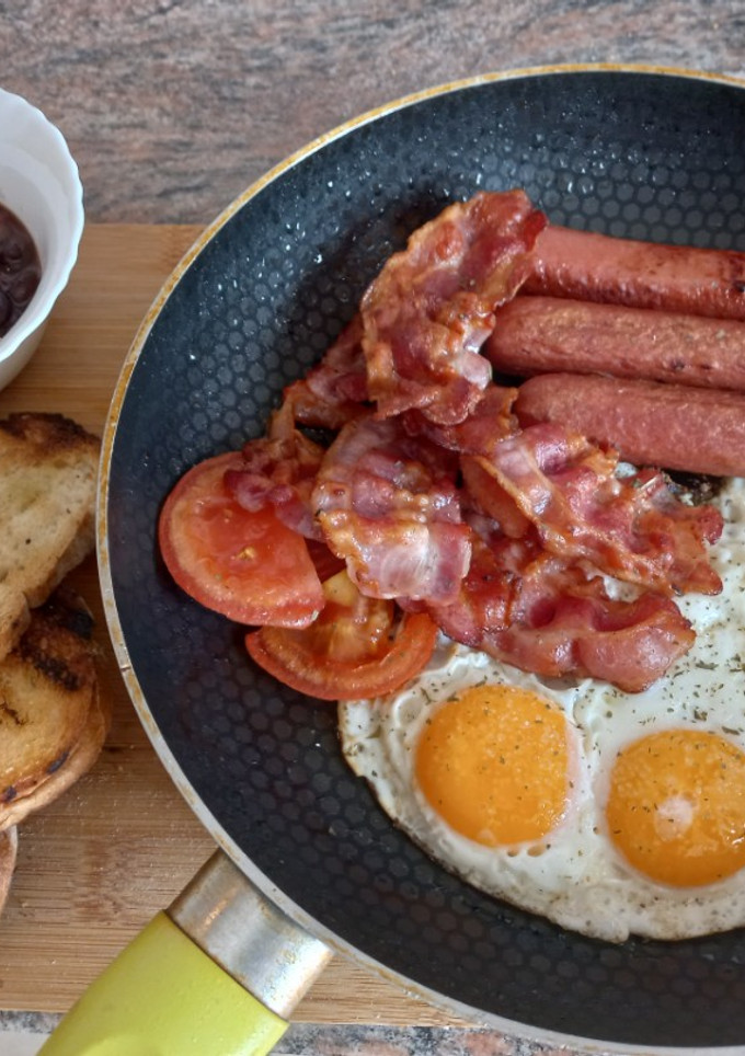 Una foto de Huevos para el desayuno 🍳🥓