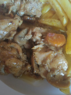 Una foto de Pollo en salsa de cebolla