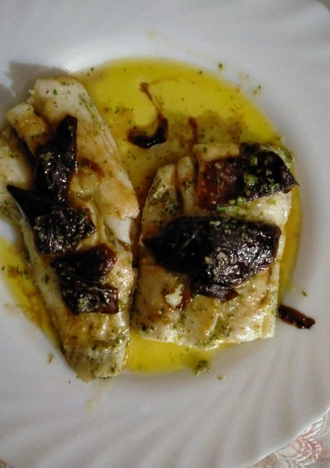 Una foto de Merluza a la salsa verde