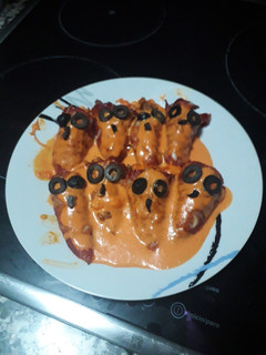 Una foto de Pimientos rellenos gratinados