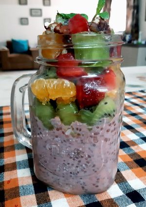 A picture of Coconut Strawberry Chia Smoothie with Fresh Fruits & Nuts.