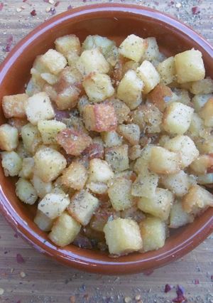 A picture of Crispy cube shaped french fries.