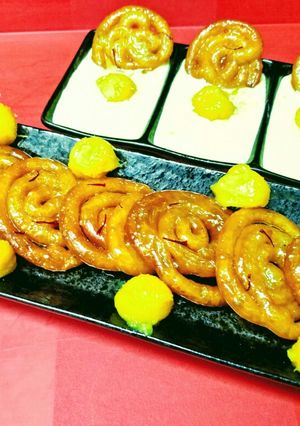 A picture of Mango Jalebis With Rabdi.