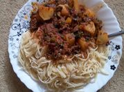 A picture of spaghetti and beef stew