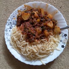 A picture of Spaghetti and beef stew.