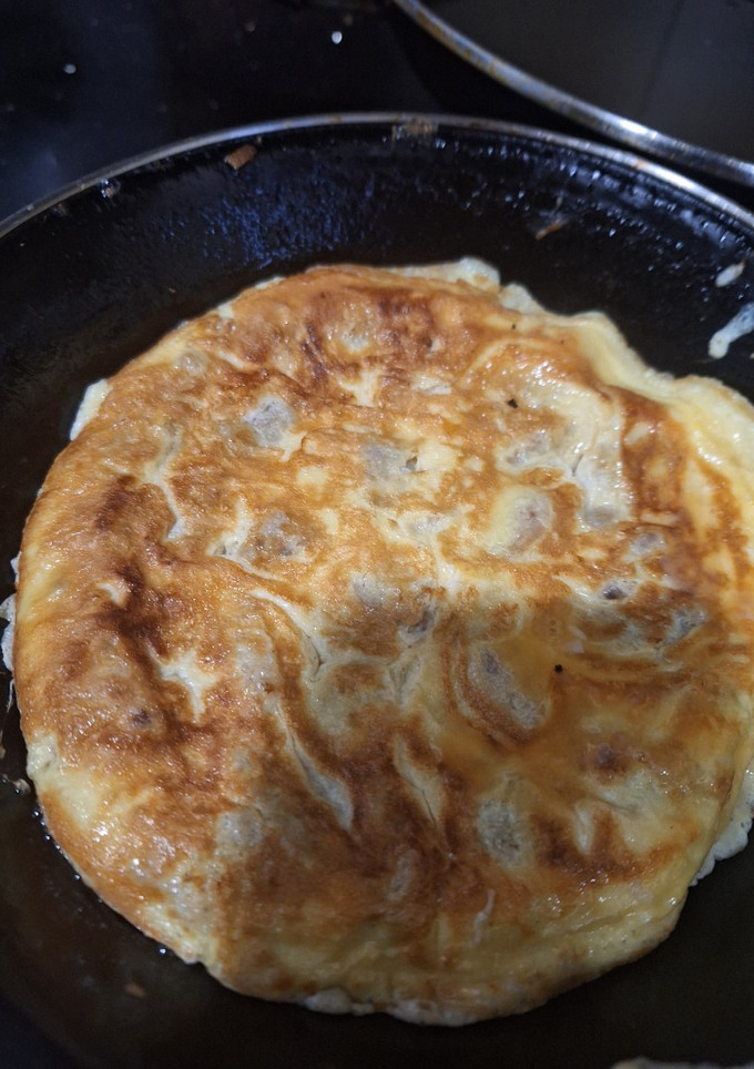 Una foto de Tortilla de butifarra de huevo