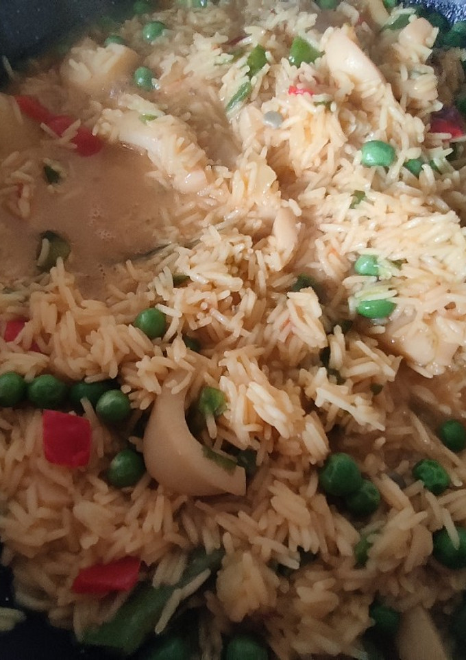 Una foto de Aros de calamar con arroz