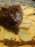 Colita de cuadril rellena, flameada y al horno
