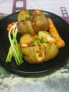 A picture of Easy Cheesy Baked Potatoes with Hotdog Sausages.