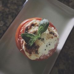 A picture of Goat Cheese Stuffed Roasted Tomatoes.
