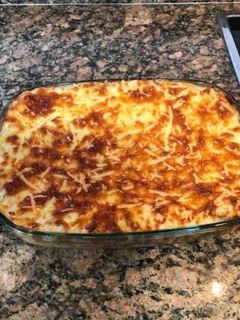Una foto de Lasaña de carne y salsa de tomate