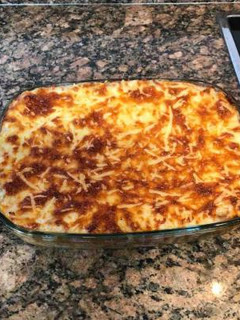 Una foto de Lasaña de carne y salsa de tomate