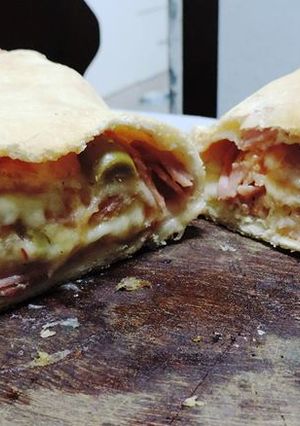 Una foto de Pizza arrollada