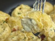 Una foto de cappelletti relleno de jamón