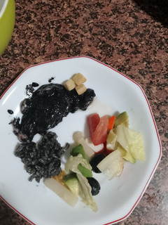 Una foto de Chipirones en su tinta