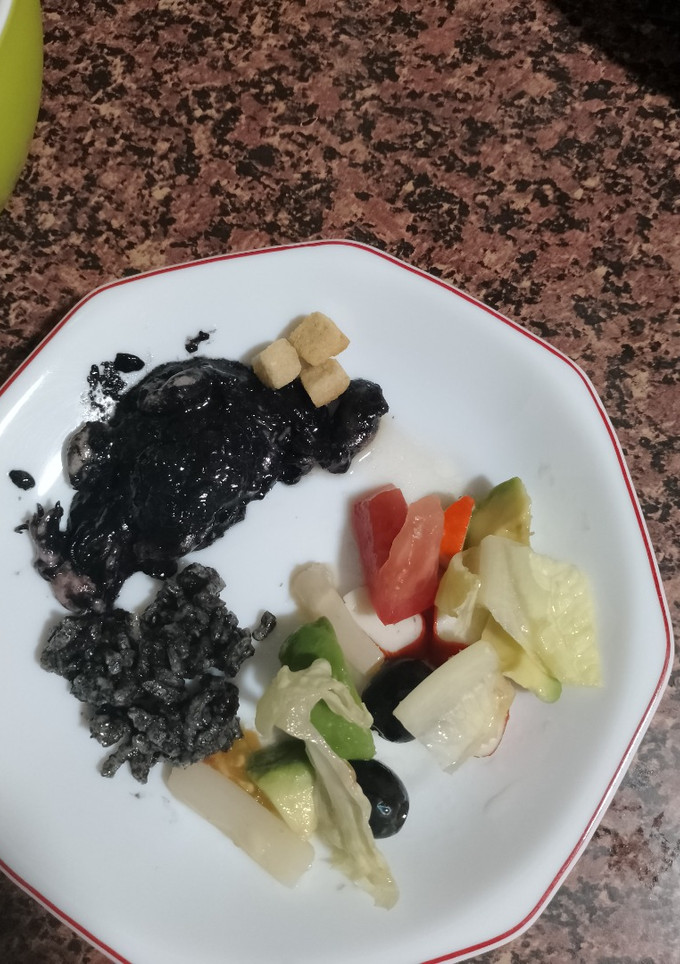 Una foto de Chipirones en su tinta