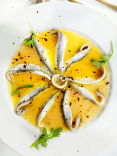 Una foto de Boquerones en vinagreta de pomelo