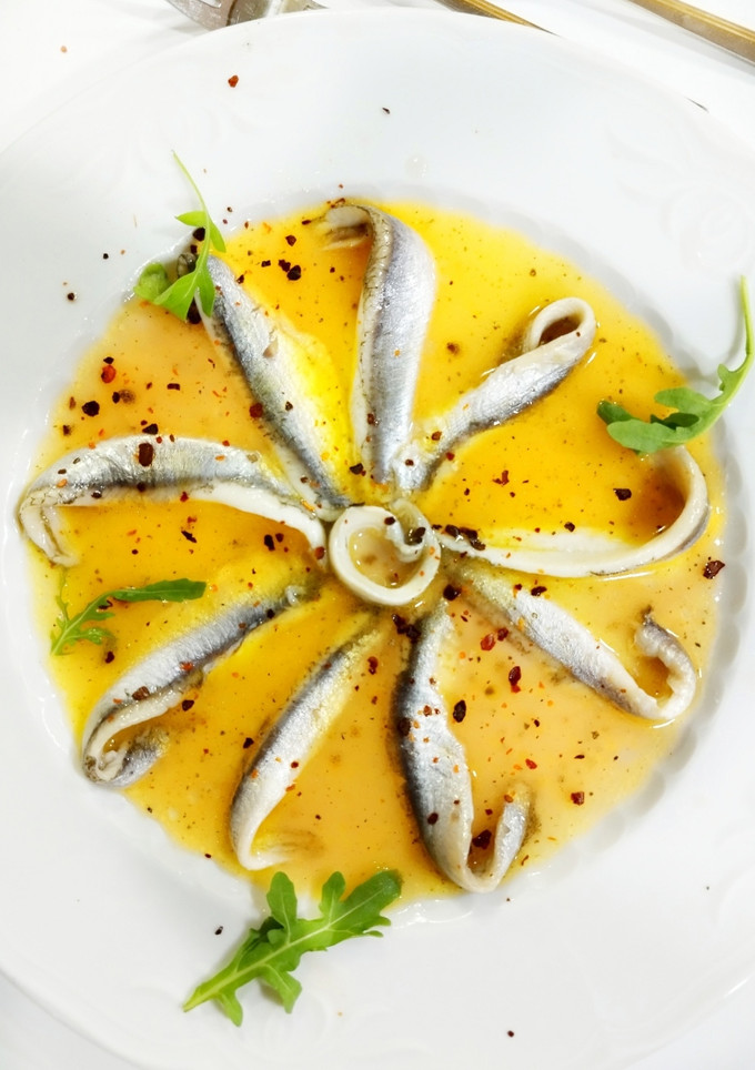 Una foto de Boquerones en vinagreta de pomelo
