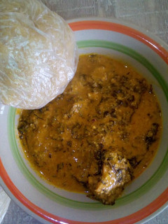 A picture of Groundnut soup and ugali.