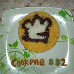 A picture of Coconut rice with red oil.