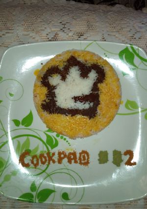 A picture of Coconut rice with red oil.