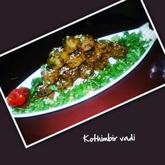 A picture of Kothimbir vadi.