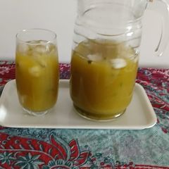 A picture of Raw mango mint leaves drink.