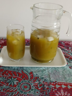 A picture of Raw mango mint leaves drink.