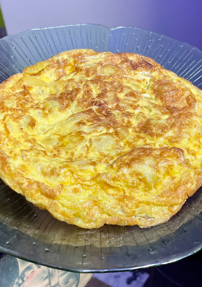 Una foto de Tortilla de patatas con cebolla