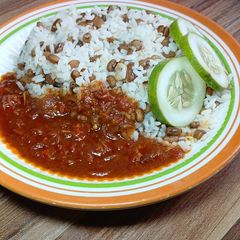 A picture of Rice and Beans with Sardine Stew.
