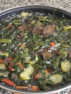 Una foto de Arroz negro con verduras al horno