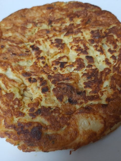 Una foto de Tortilla de patatas con cebolla