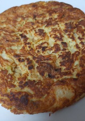 Una foto de Tortilla de patatas con cebolla