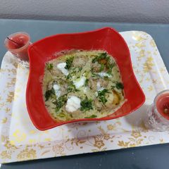 A picture of Paneer malai kofty with white gravy.