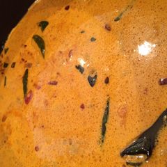 A picture of Chicken Kumbalanga Curry (chicken with white pumpkin).