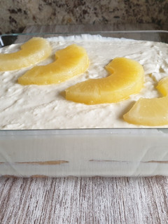 Una foto de Tiramisú de piña