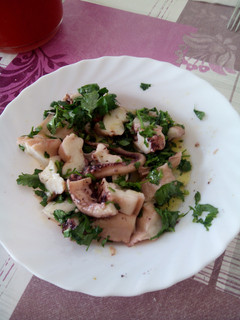 Una foto de Calamares en salsa verde