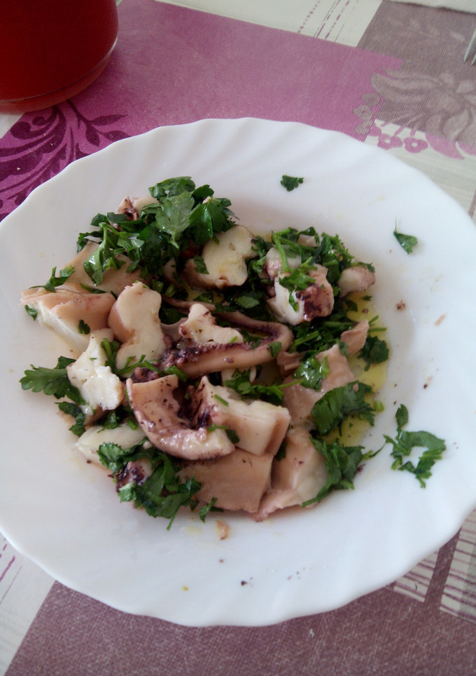 Una foto de Calamares en salsa verde