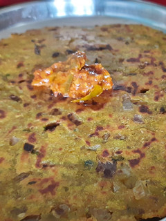 पोह्याचे खमंग थालीपीठ रेसिपी (pohache thalipeeth recipe in marathi) रेसिपी चे मुख्य फोटो