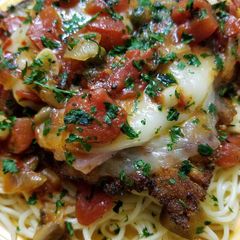 A picture of Veal Scallopini Piccata.