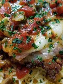 A picture of Veal Scallopini Piccata.