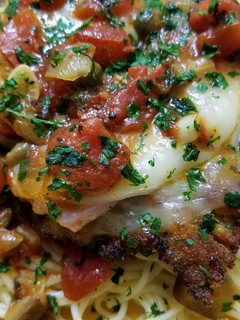 A picture of Veal Scallopini Piccata.