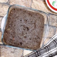 A picture of Fudge pot with dark couverture nuts seeds & healthy flours.