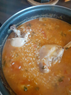 Una foto de Arroz caldoso con pollo