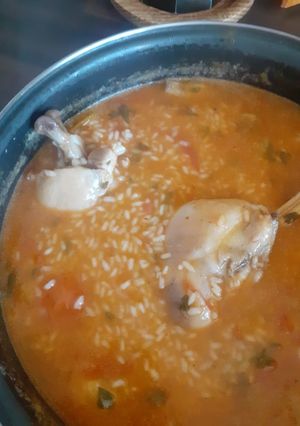 Una foto de Arroz caldoso con pollo